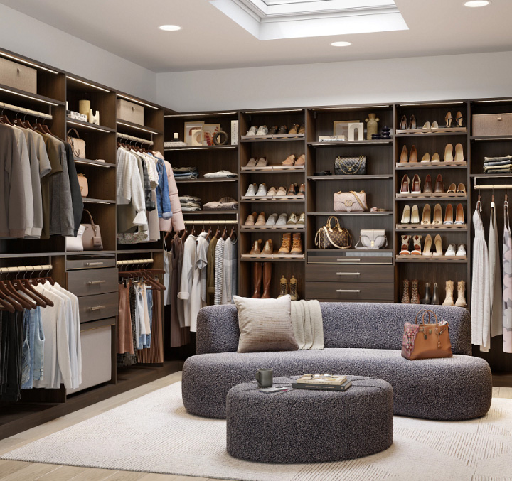 Spacious and organized walk-in closet with custom shelving, drawers, and hanging space, providing a luxurious and functional storage solution for clothing and accessories